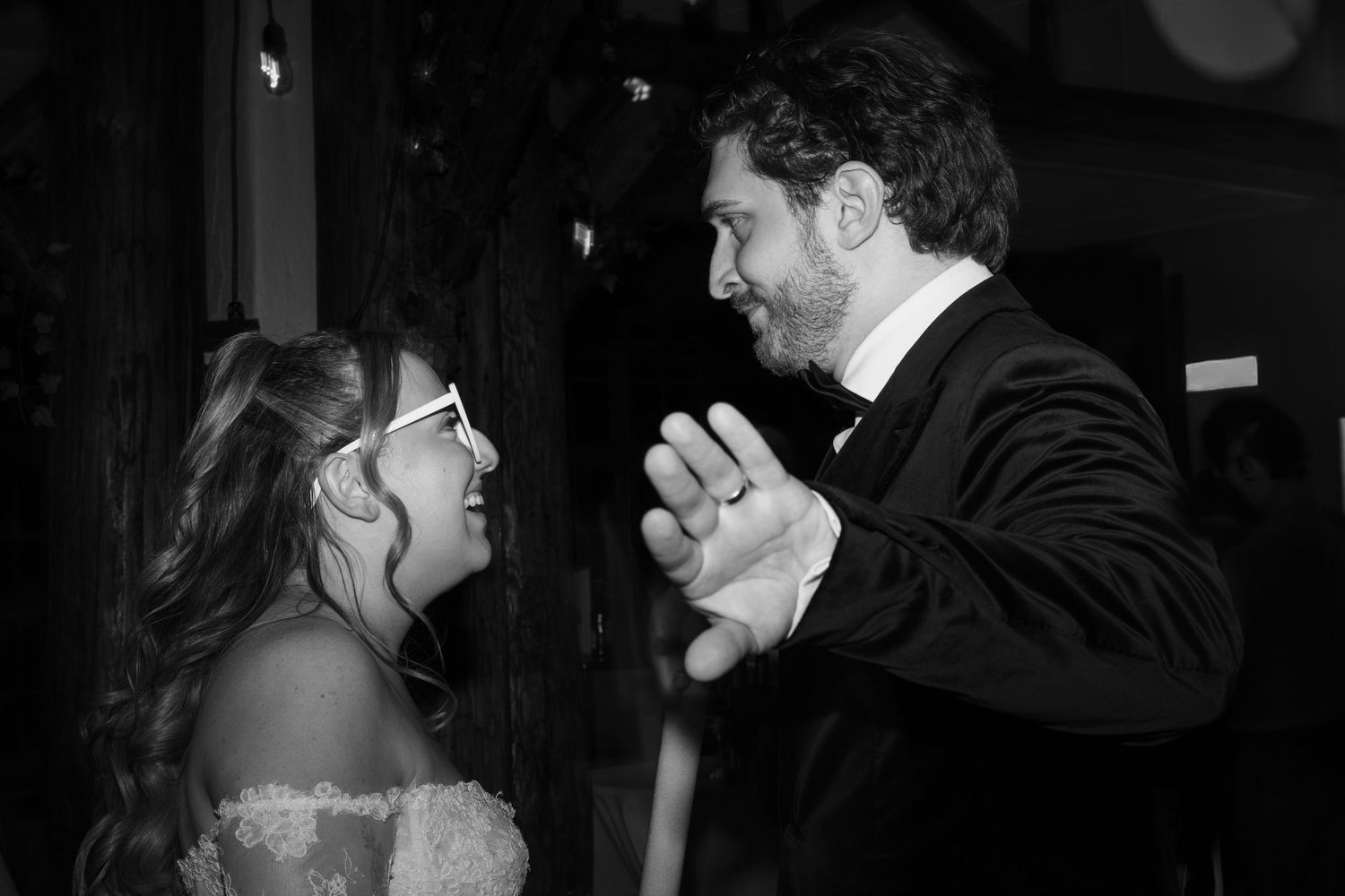 A series of black and white photos showing couples dancing together at what appears to be a formal event.