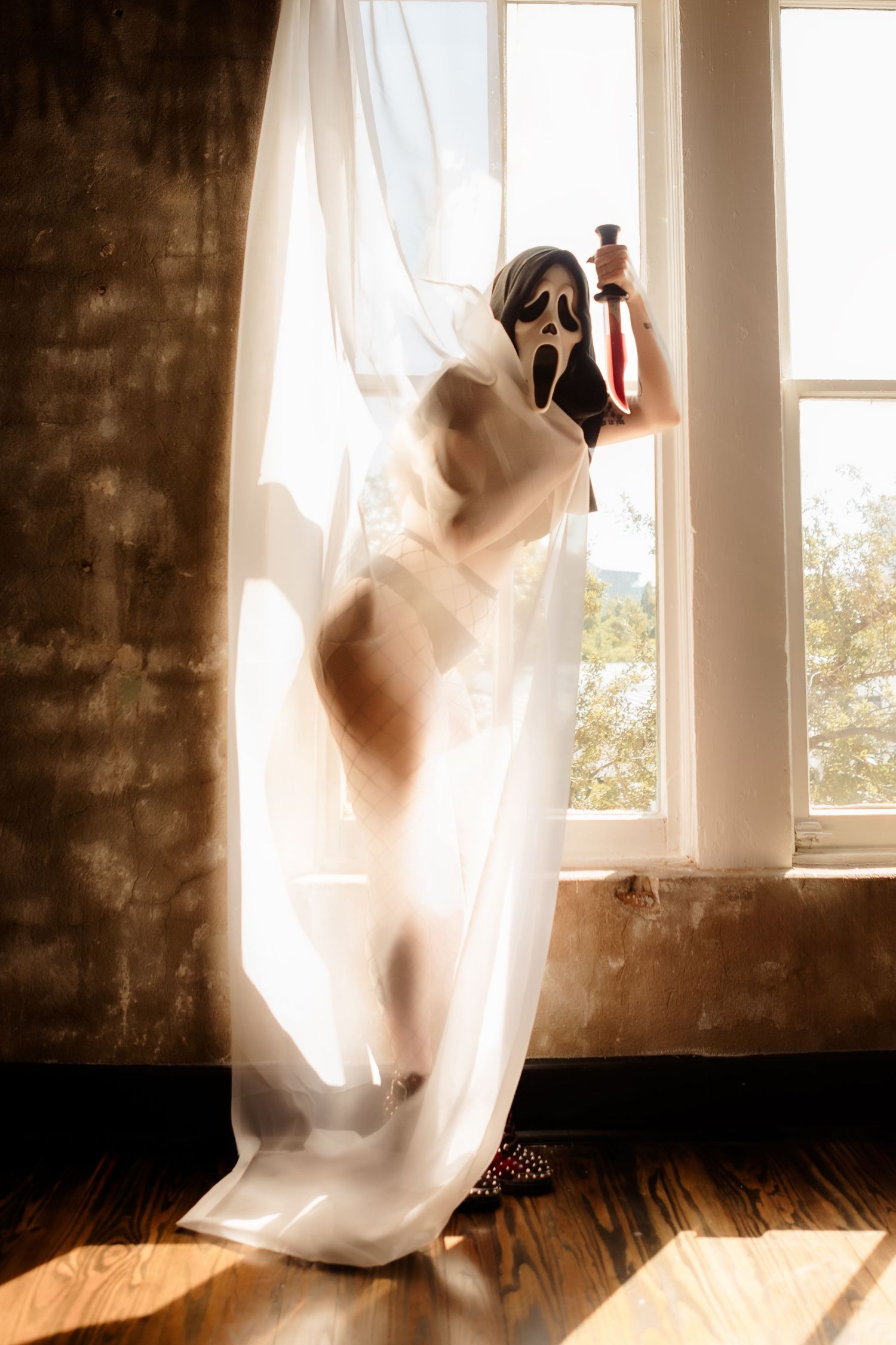 Studio boudoir portrait with moody lighting