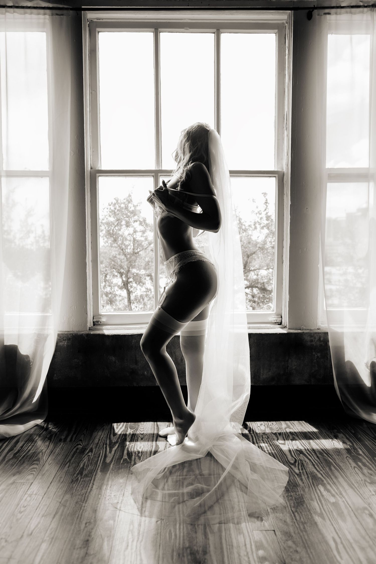 Studio bridal boudoir portrait with moody lighting