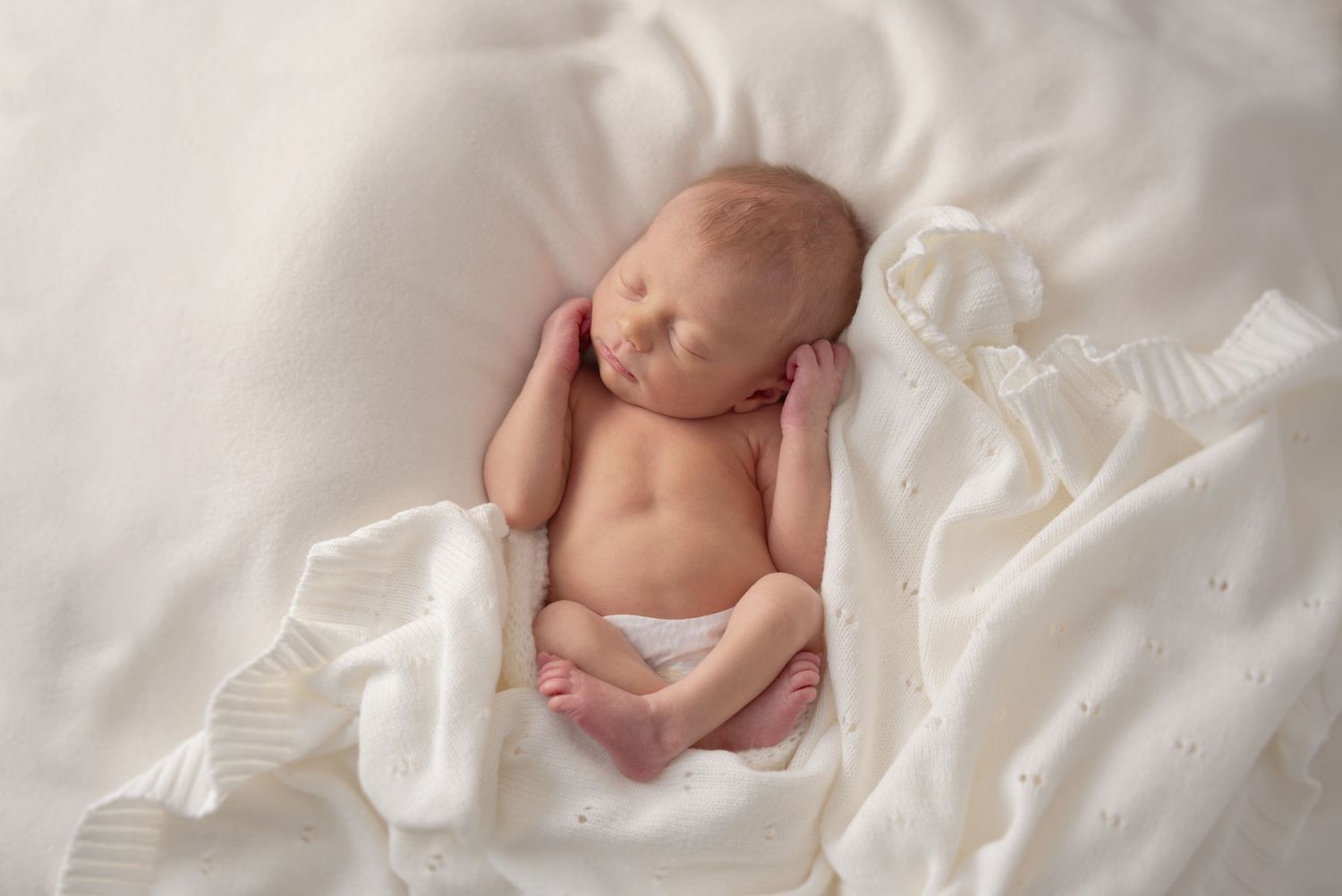Relaxed, baby-led newborn photography in Chesterfield starting at £95. All-inclusive mobile studio session by Andrea Green.