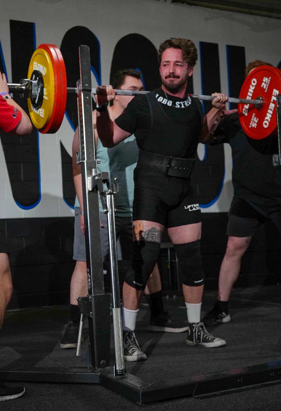 a man squatting