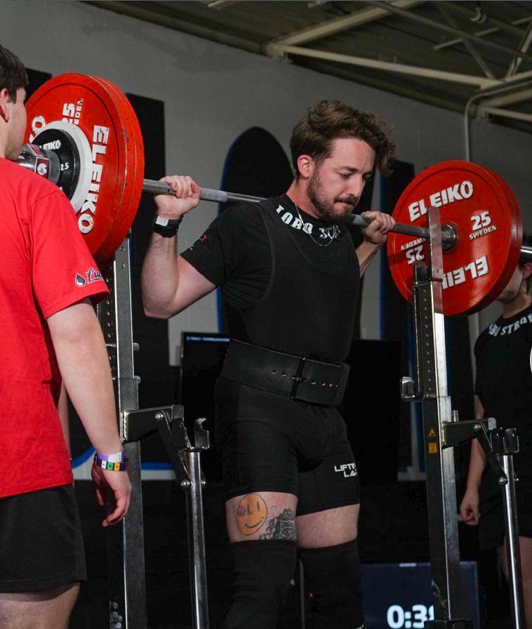 a man squatting