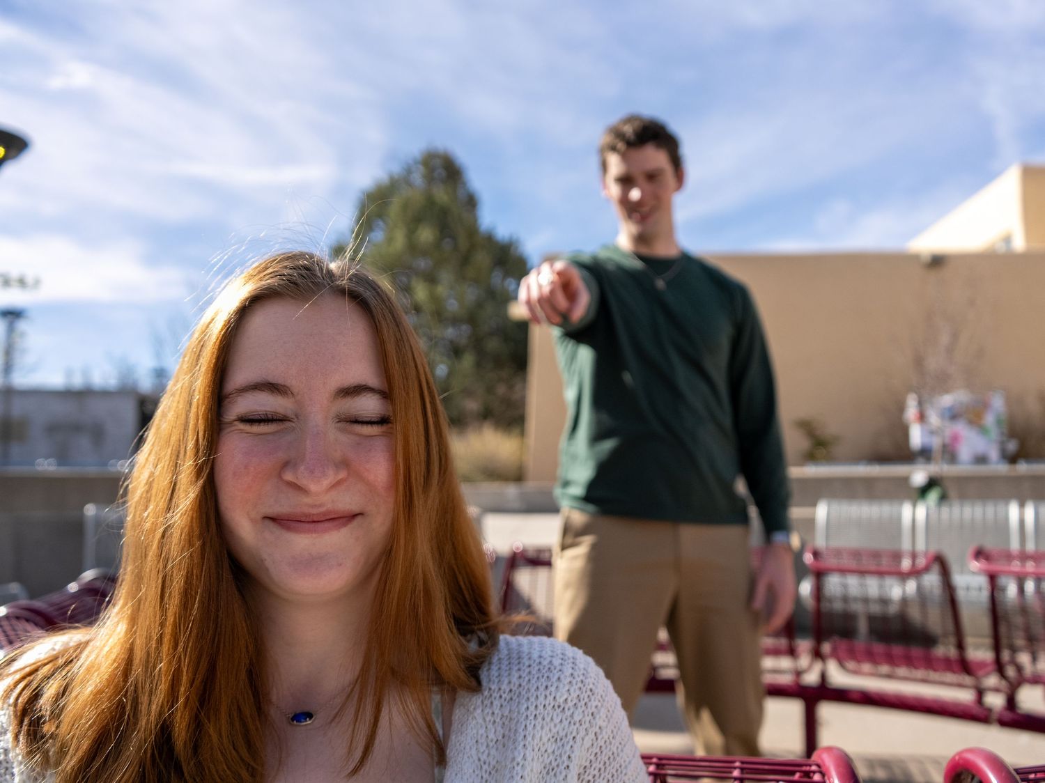 a couple posing silly for a photoshoot