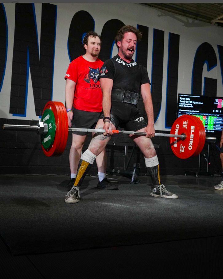 a man deadlifting