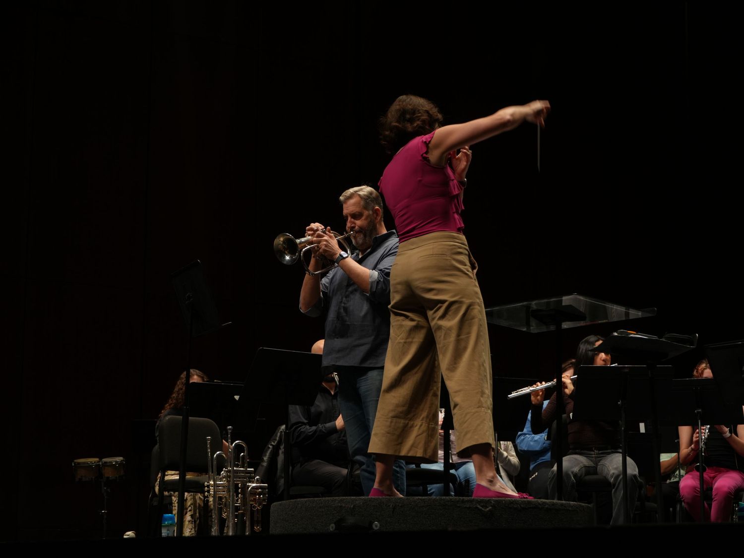 a conductor and trumpet player