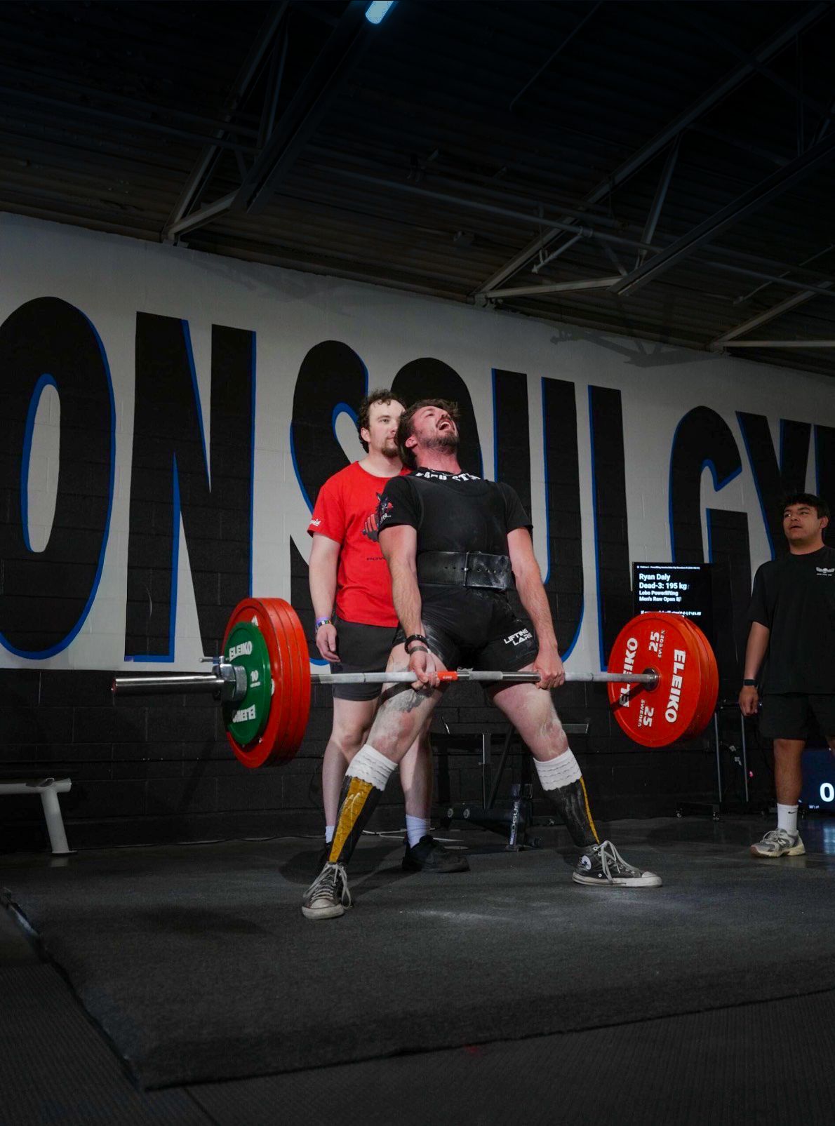 a man deadlifting