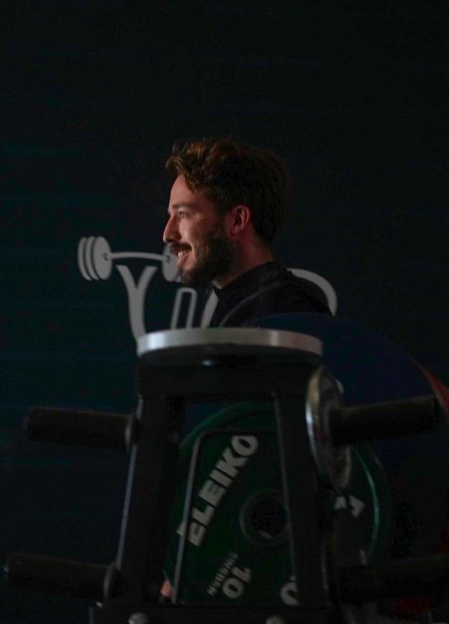 a man squatting