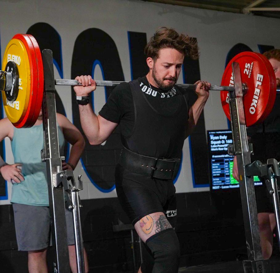 a man squatting