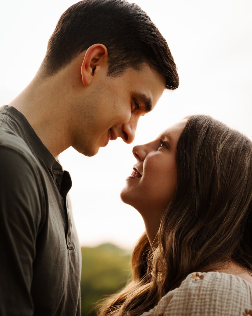 Intimate close-up shots of an expectant couple sharing tender moments together.