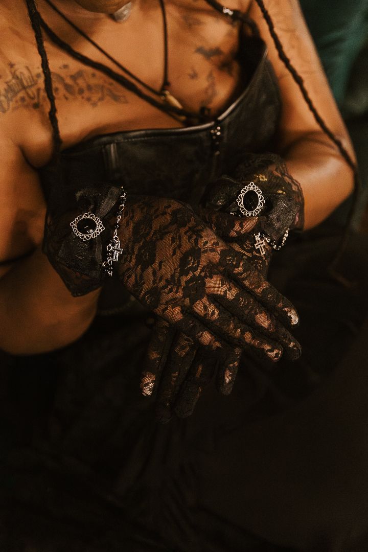 Black lace lingerie details shown in a series of close-up shots highlighting delicate fabric patterns and textures.