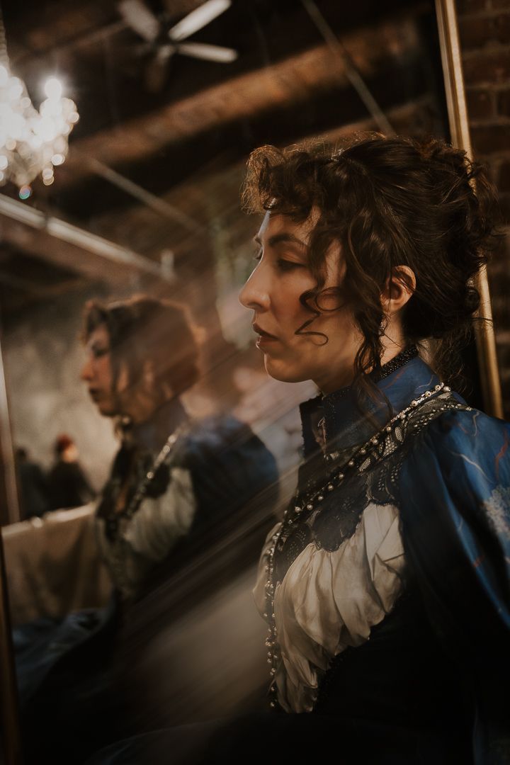 Moody side profile portraits in vintage style with dramatic lighting and Victorian-era fashion details.