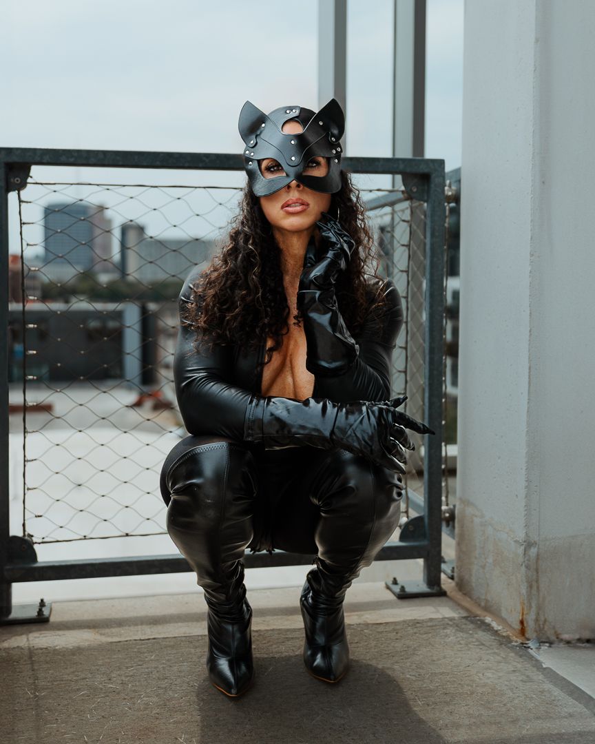 Figure in black leather and sunglasses poses by a window in an urban setting through multiple creative compositions.