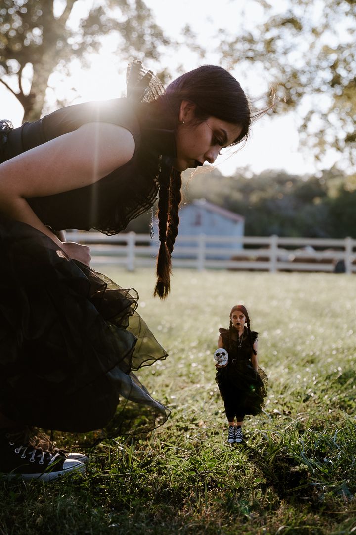 A sequence of silhouettes in a field of wildflowers at sunset shows someone picking flowers in golden light.