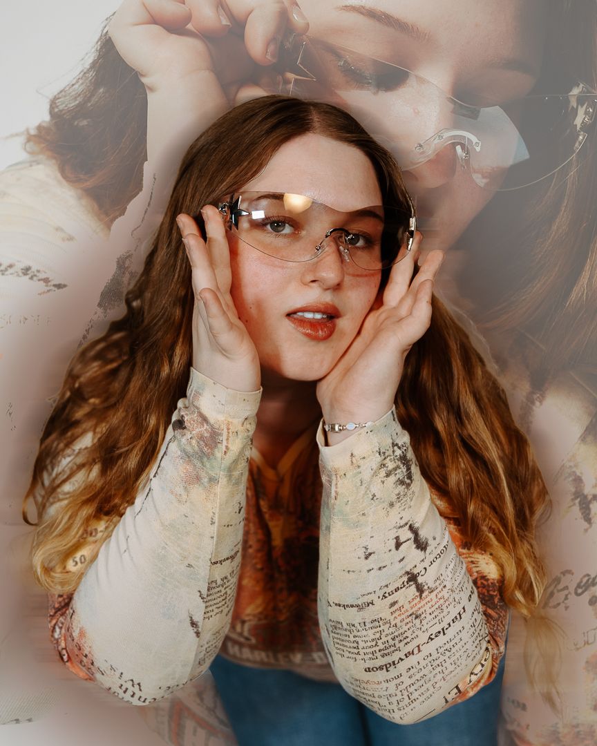 Multiple exposure portrait showing dreamy overlapped poses in soft lighting with lace details and blue tones.