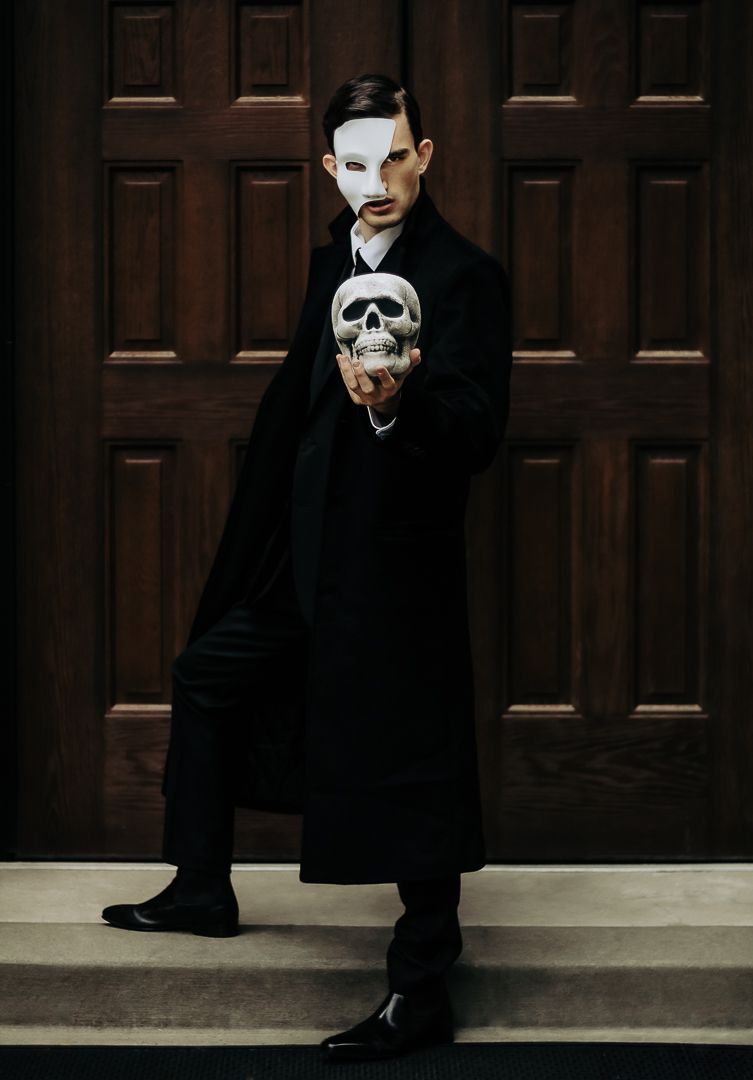 Gothic portrait series featuring skull mask and dark formal wear against wooden panels.