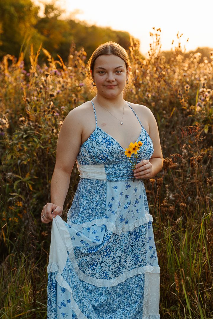 A sequence of sunset portraits showing a light blue floral dress against tall grass in golden hour lighting.