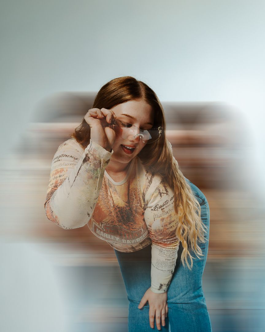 Motion blur effect fashion photo series featuring lace top and artistic poses.