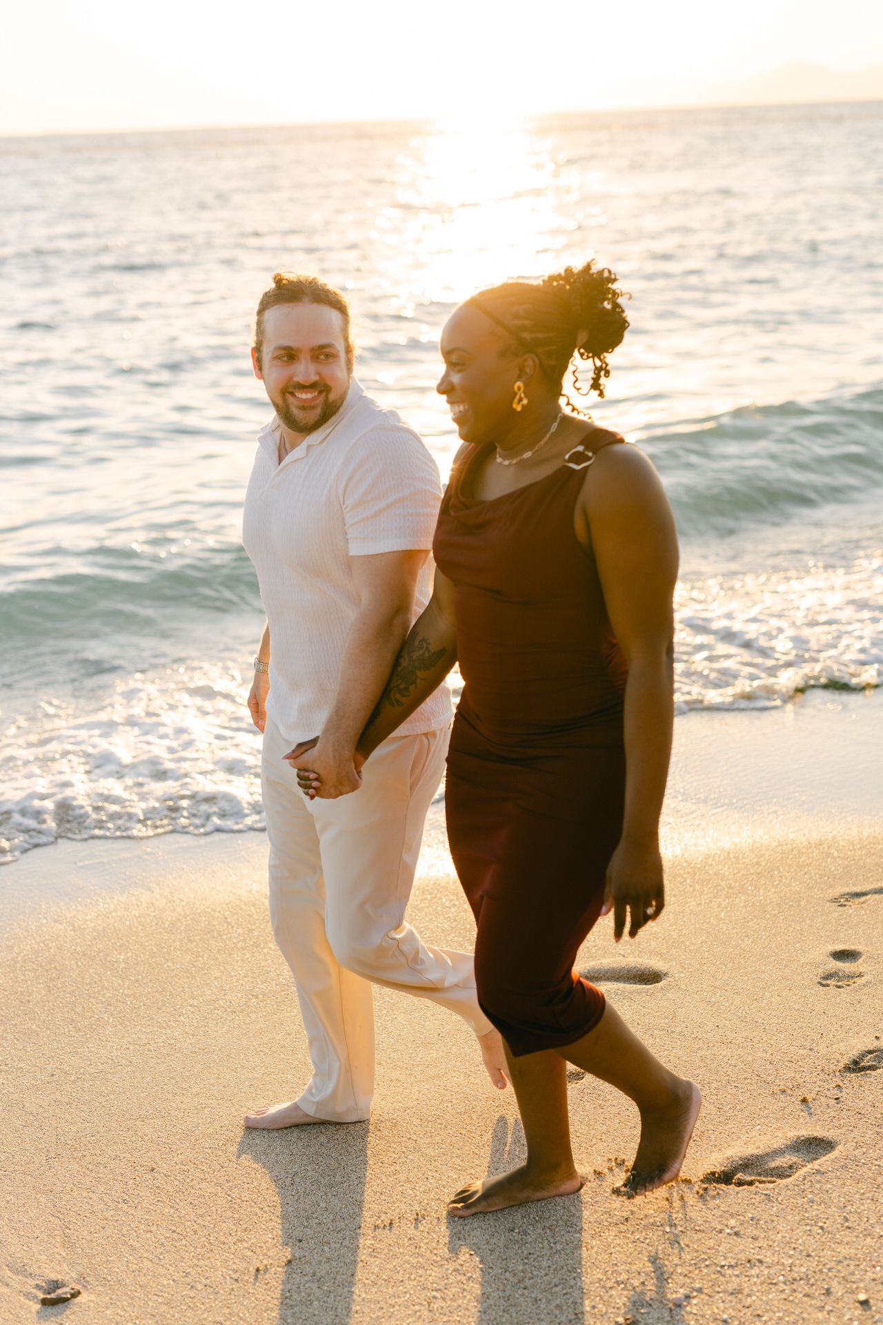 Couple photos in Athens Riviera, romantic walking portraits by the water in golden hour.
