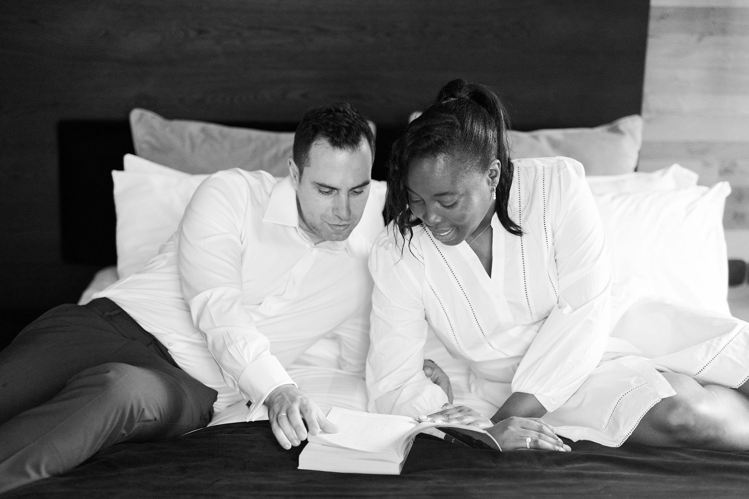 Private couple lifestyle session in an Athens hotel or Airbnb, soft window light and intimate connection.