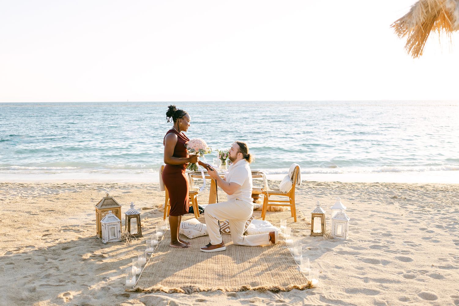 Surprise proposal in Athens captured discreetly in soft natural light, refined editorial couple portrait.