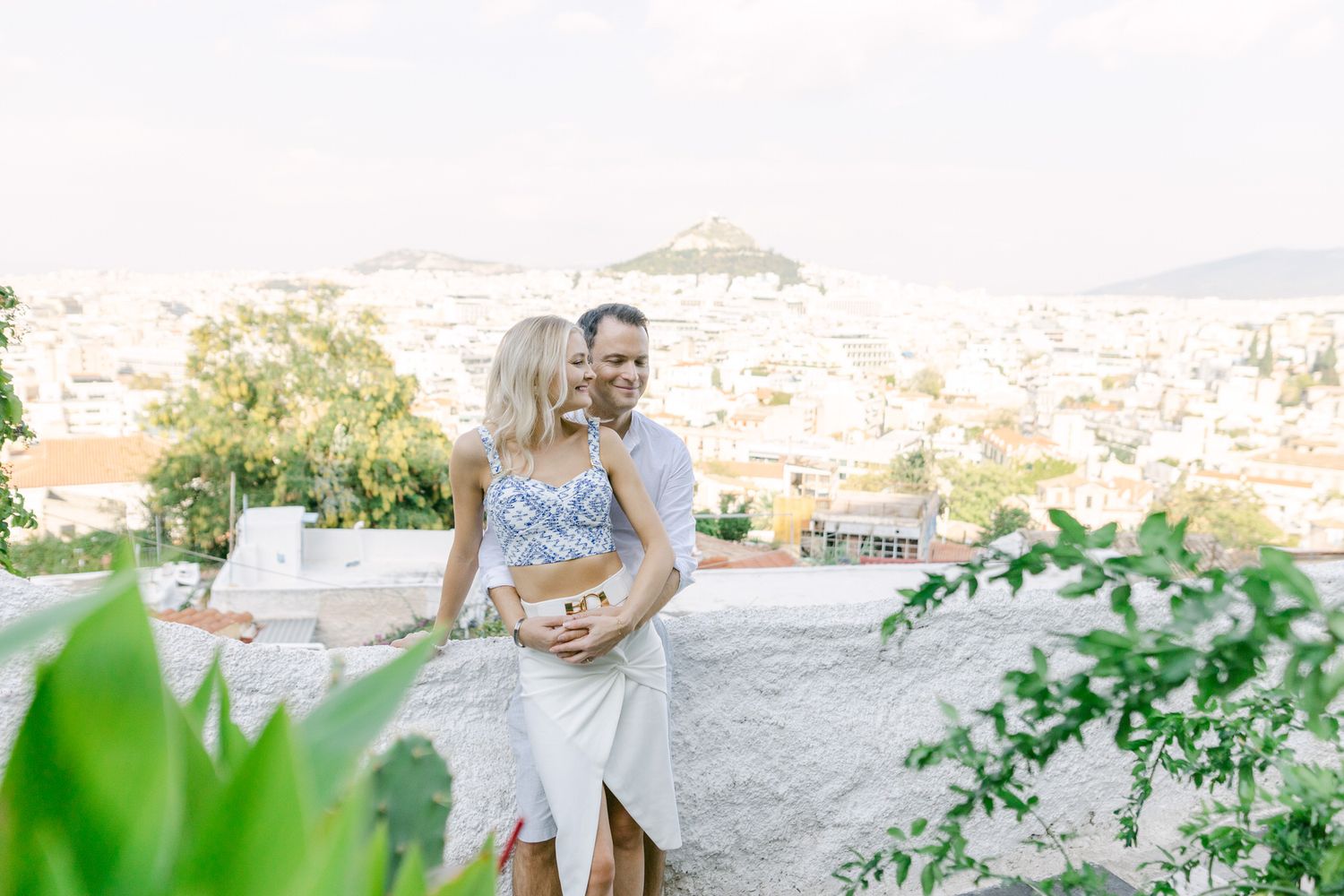 Editorial couple photoshoot in Athens, romantic portrait in soft natural light, guided gently with a refined finish