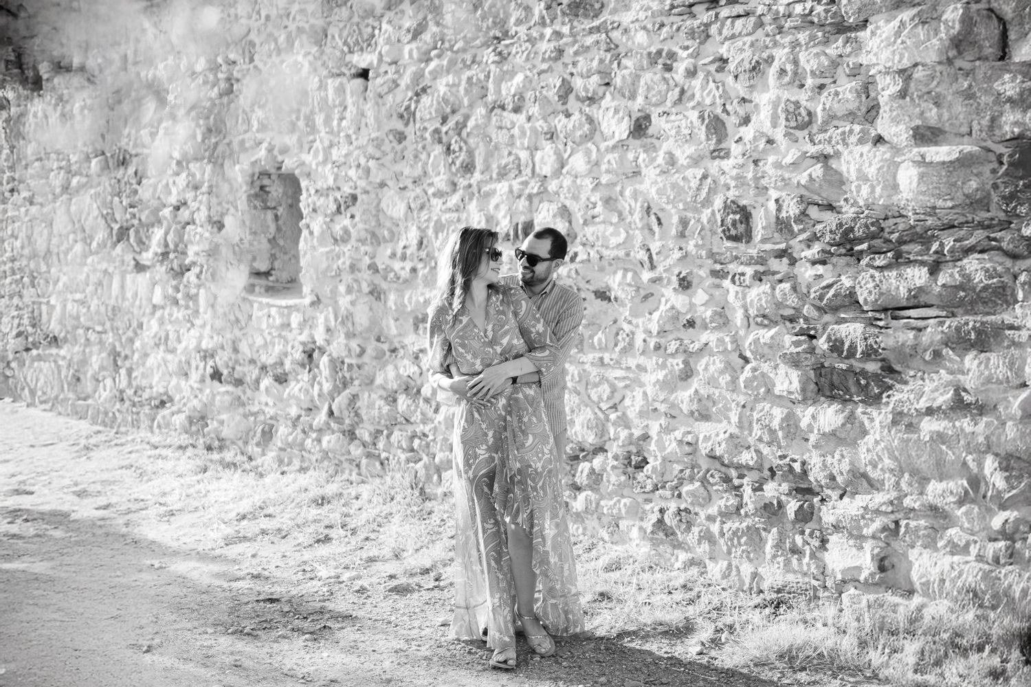 Athens Riviera engagement photoshoot at sunset, sea light and romantic editorial portraits.