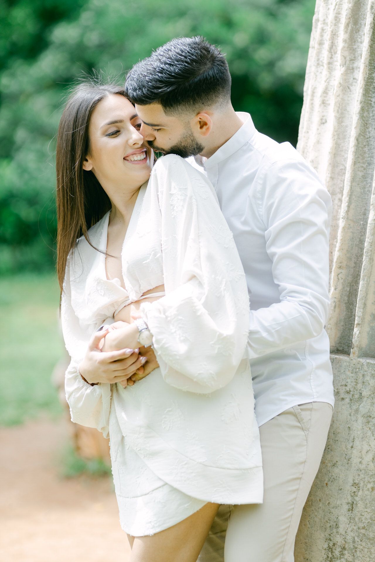Romantic couple portrait in Athens, soft natural light and intimate lifestyle moment.