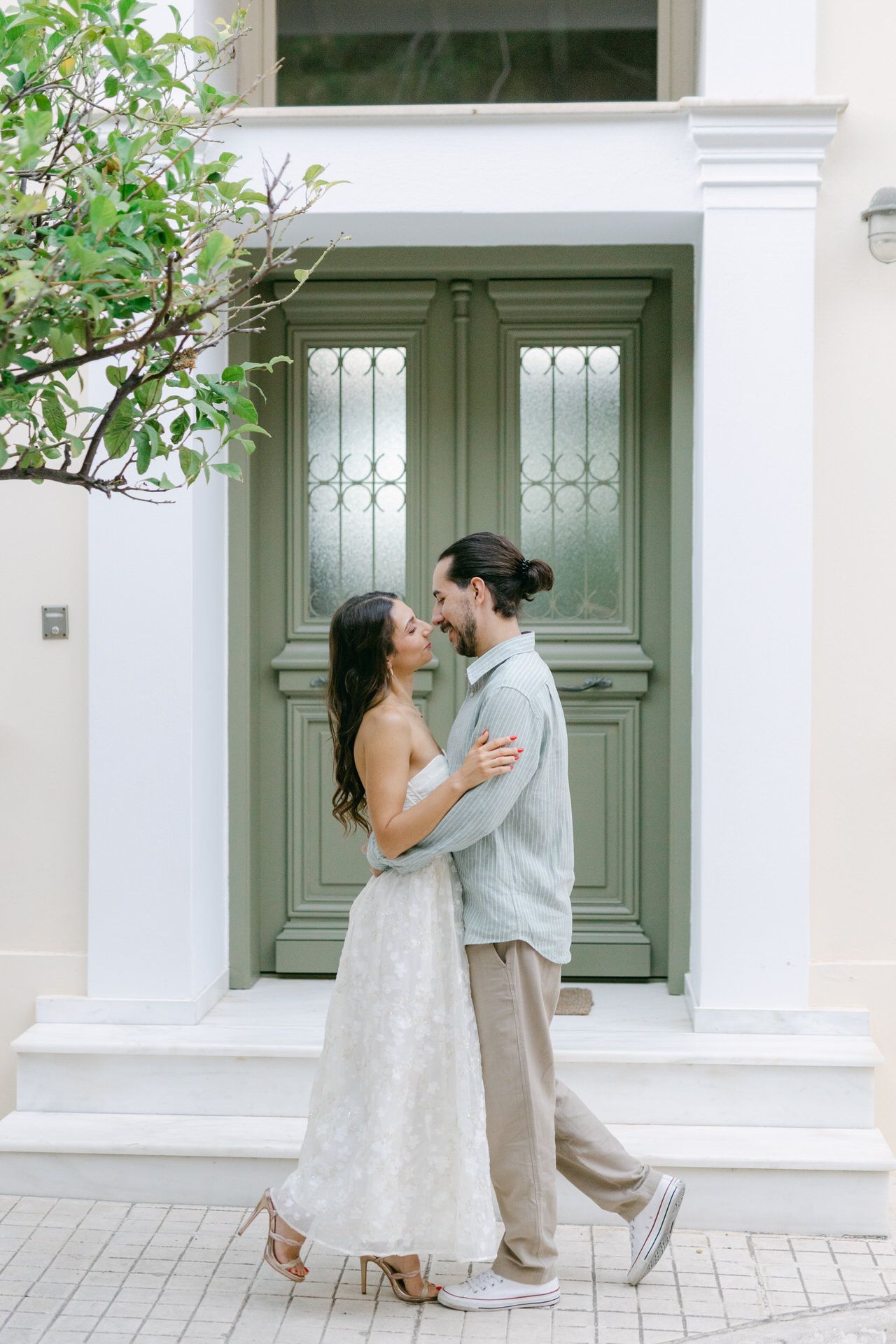 Couple photoshoot in Plaka Athens, romantic editorial portrait in soft natural light.
