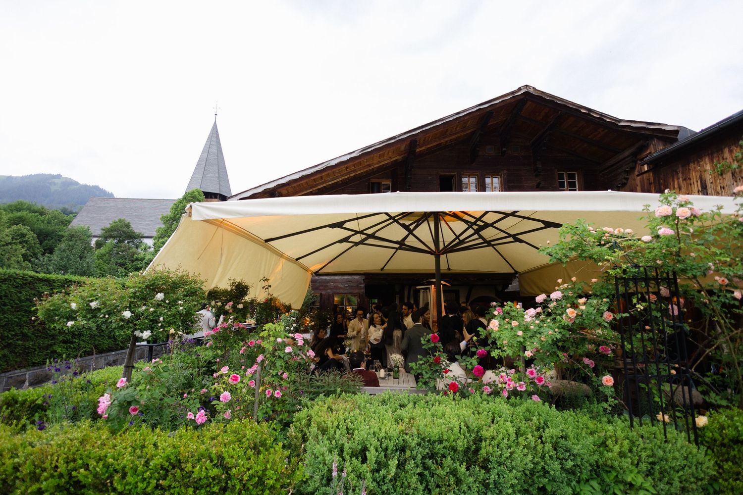 Rose-filled terrace at a wedding reception in Saanen