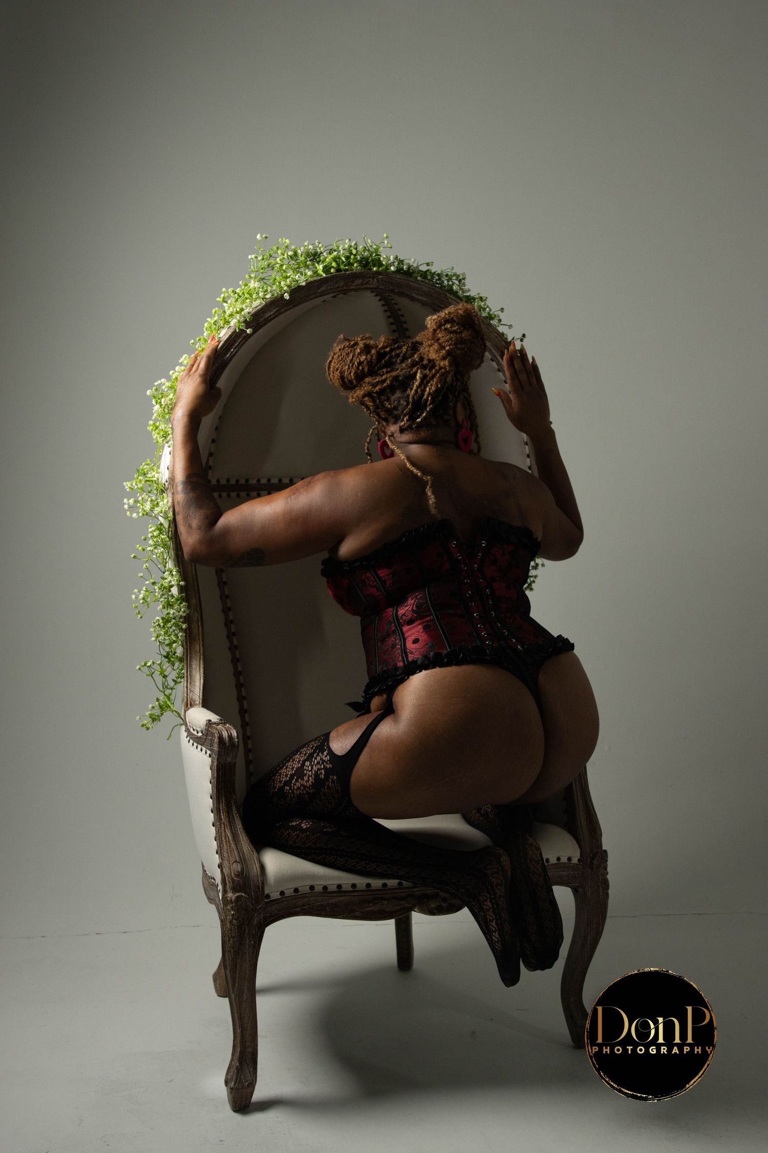 Body-positive empowerment session capturing quiet strength and softness through intentional pose and light. boudoir