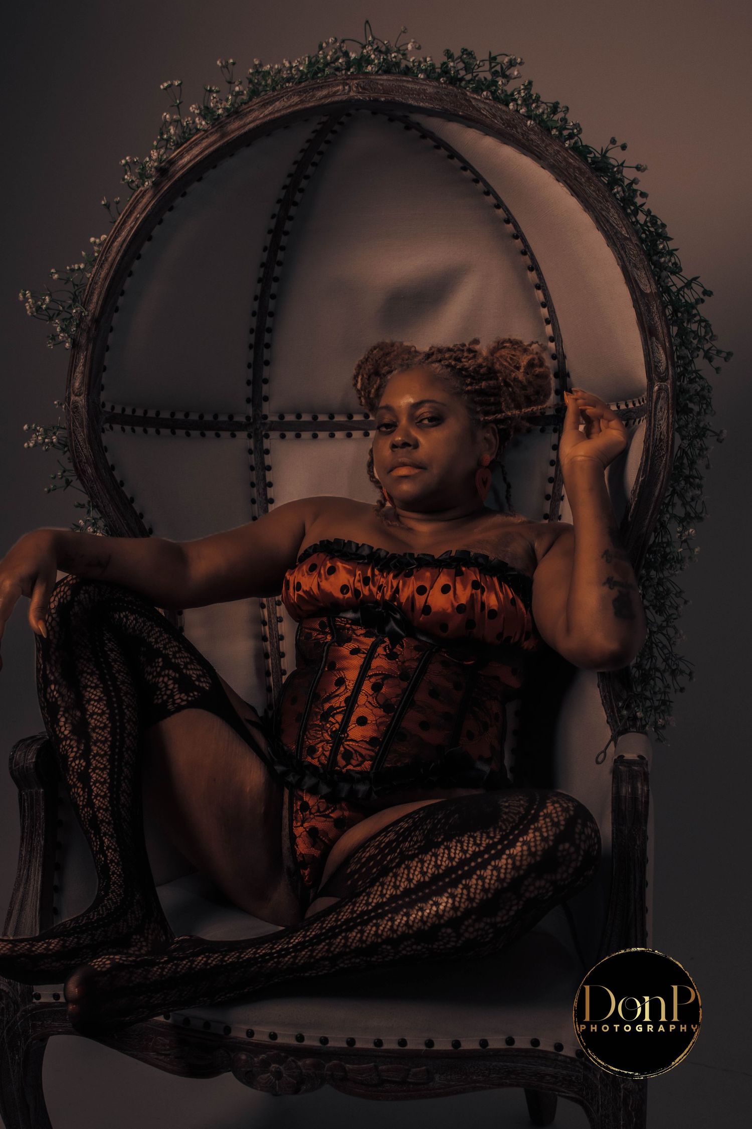 Empowering low-light portrait focused on individuality, confidence, and being fully seen in an inclusive photography space. boudoir