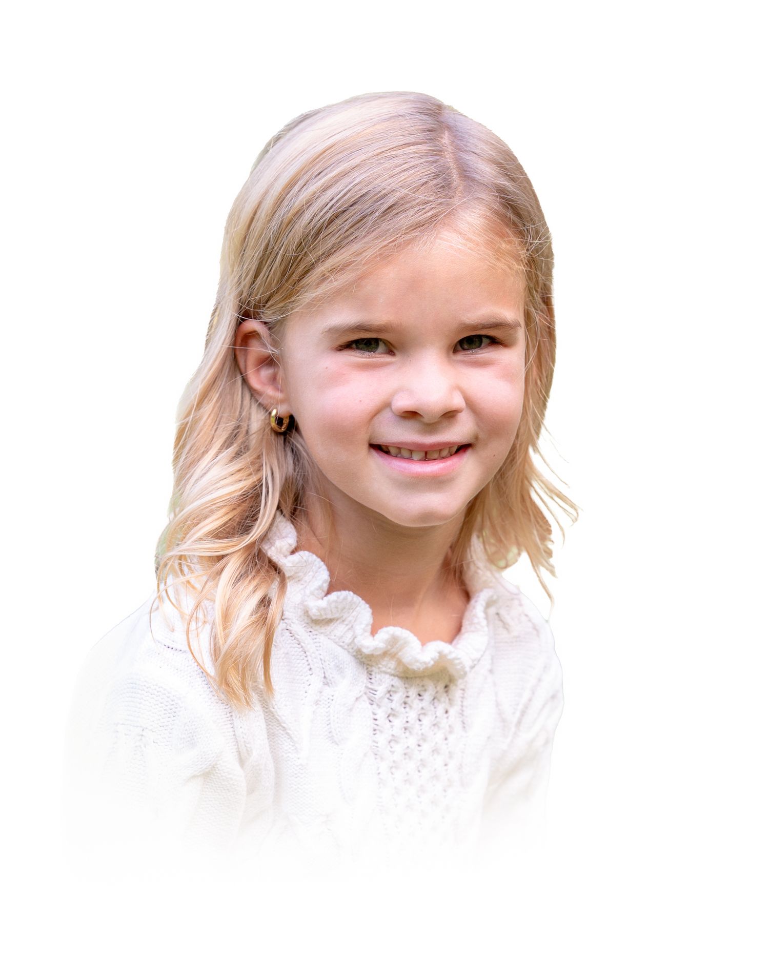 A young child with blonde hair and a bright smile wearing a white eyelet dress.