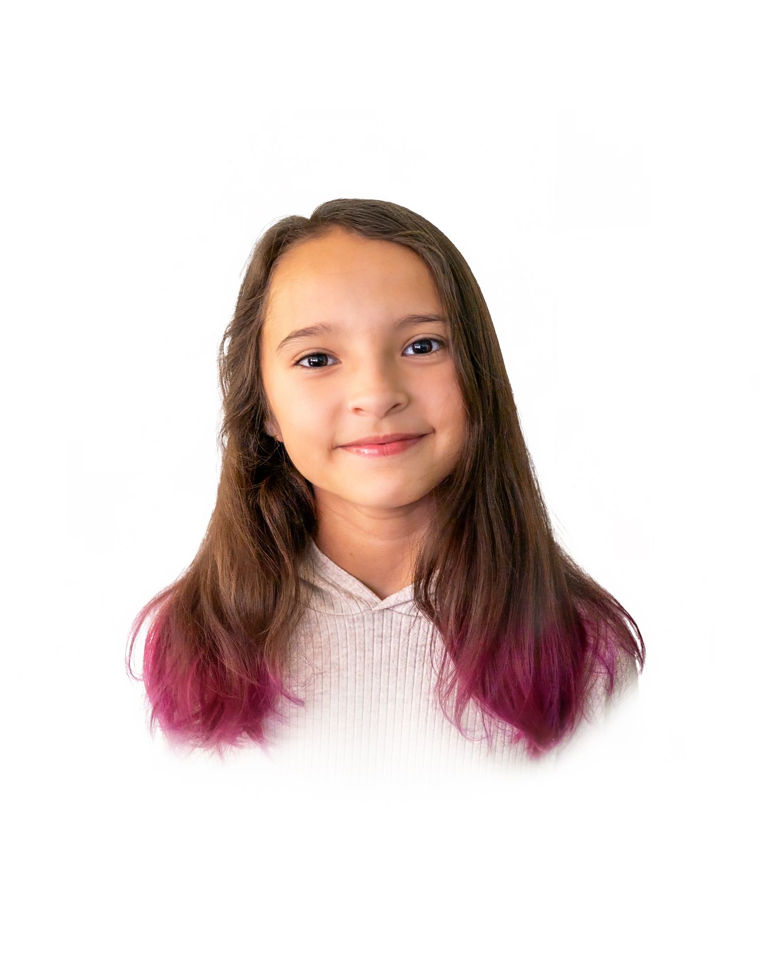 Heirloom portrait of a tween aged child.  She's wearing a white sweater. She has brown hair with the bottom dyed pink