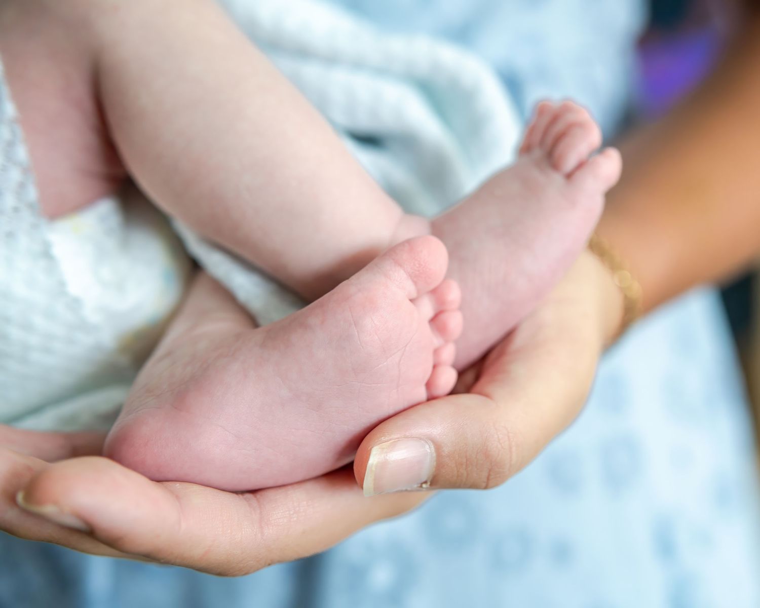 Close up of newborn baby feet