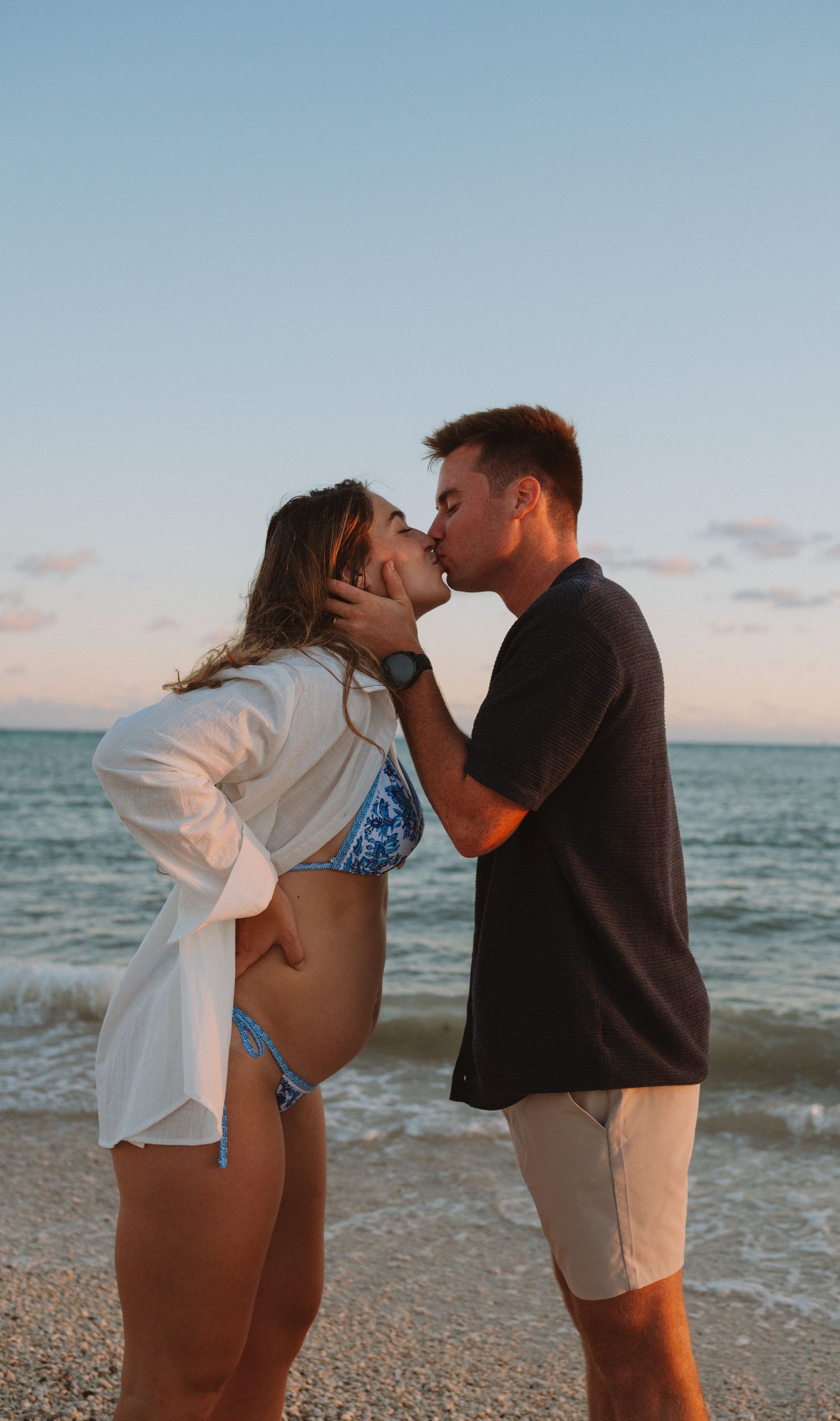Key West maternity photographer capturing beach maternity portraits with natural golden hour lighting