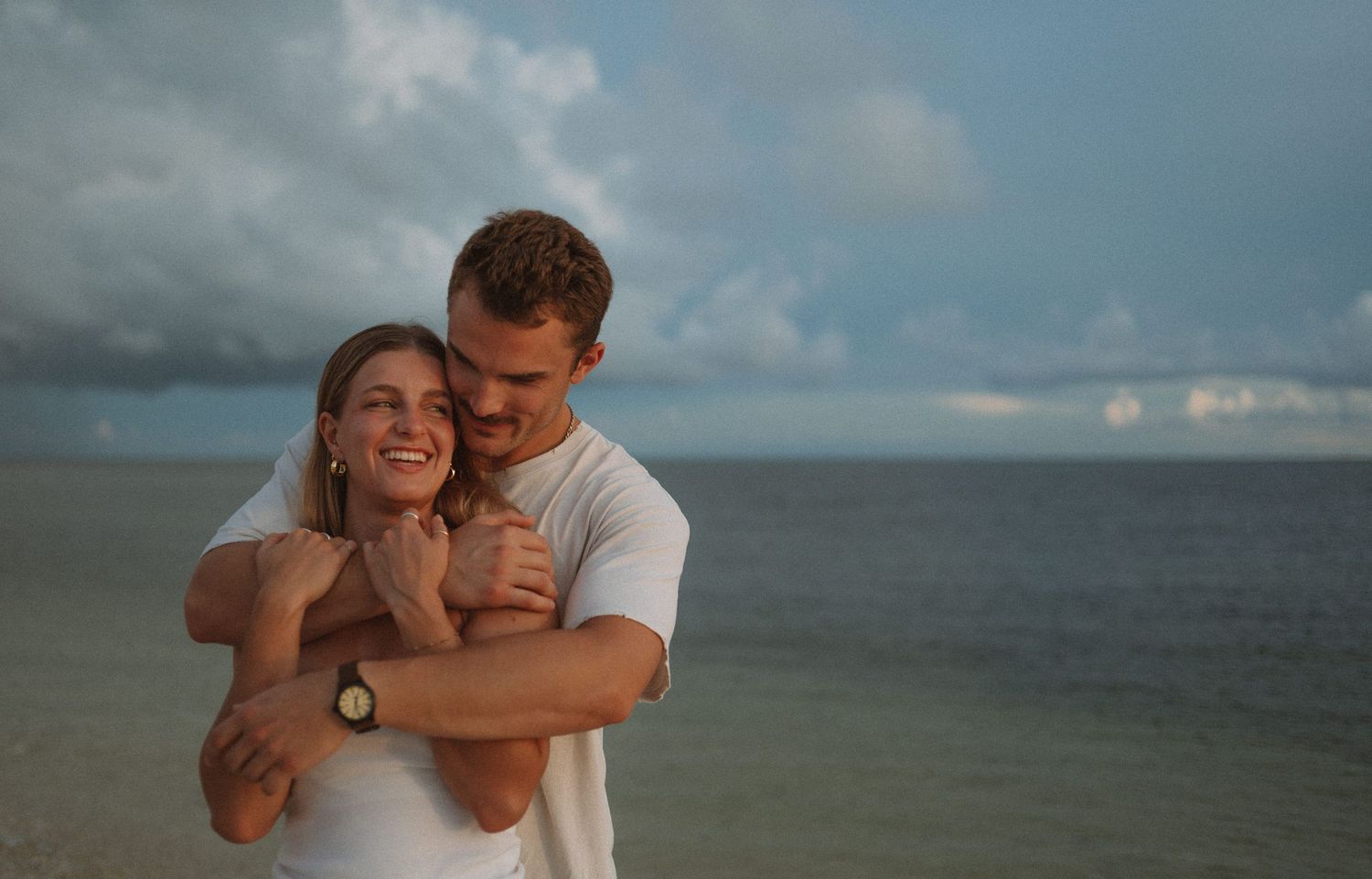 Key West couples photographer documenting romantic beach sessions with ocean views and golden light