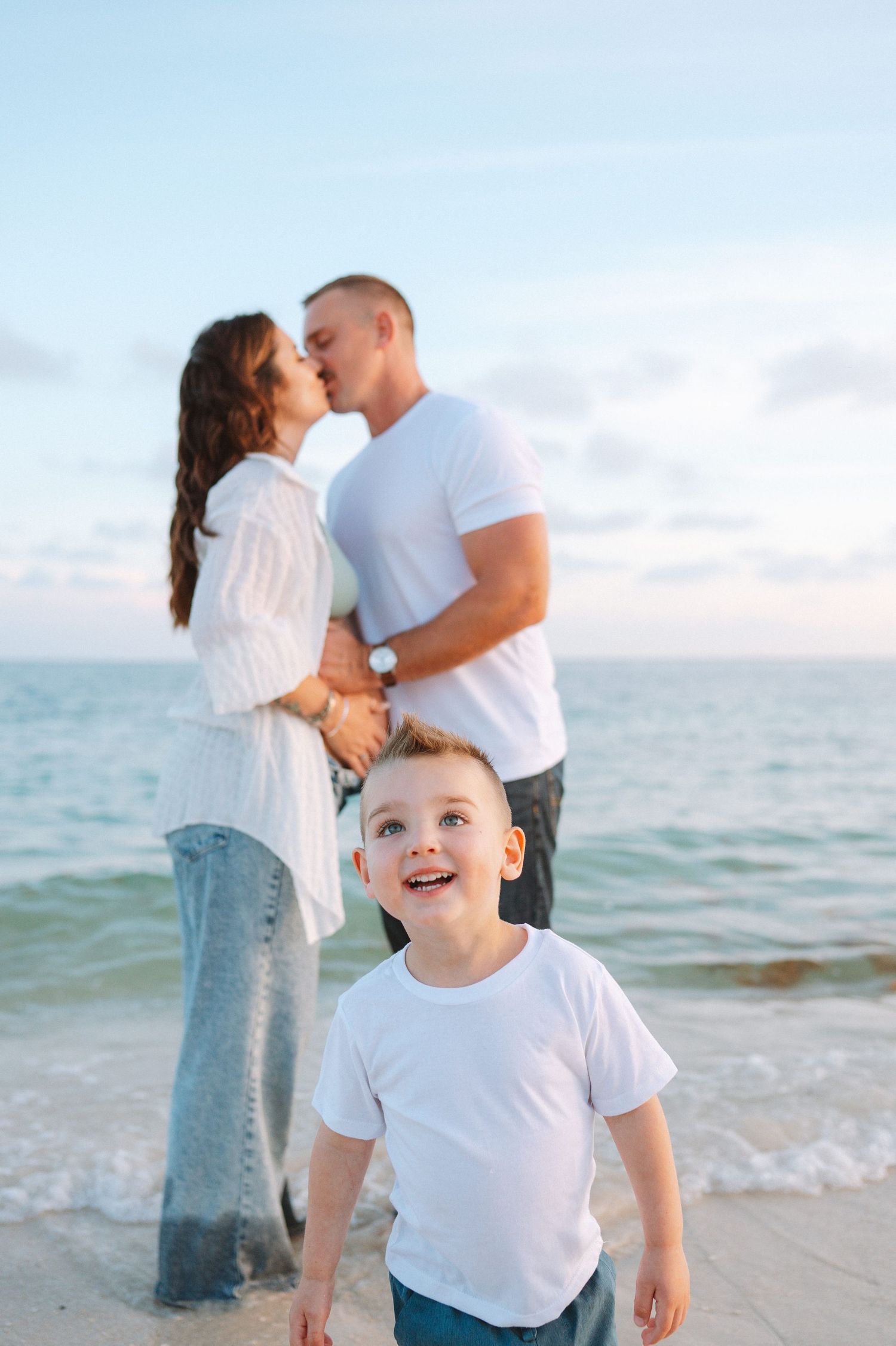 Key West family photographer documenting candid family moments with natural emotion and beach scenery