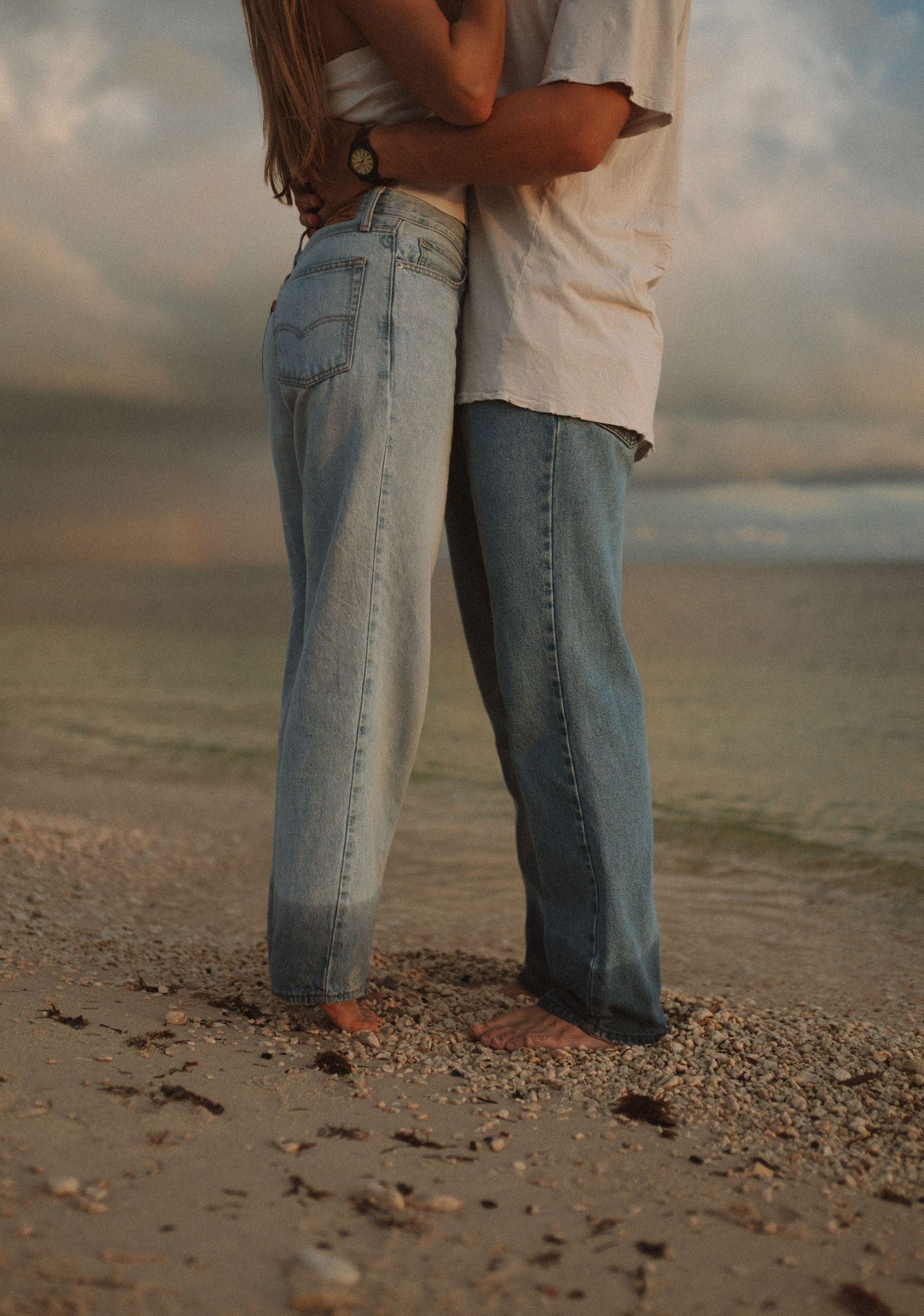 Key West beach couples photography showcasing genuine moments along the shoreline at golden hour