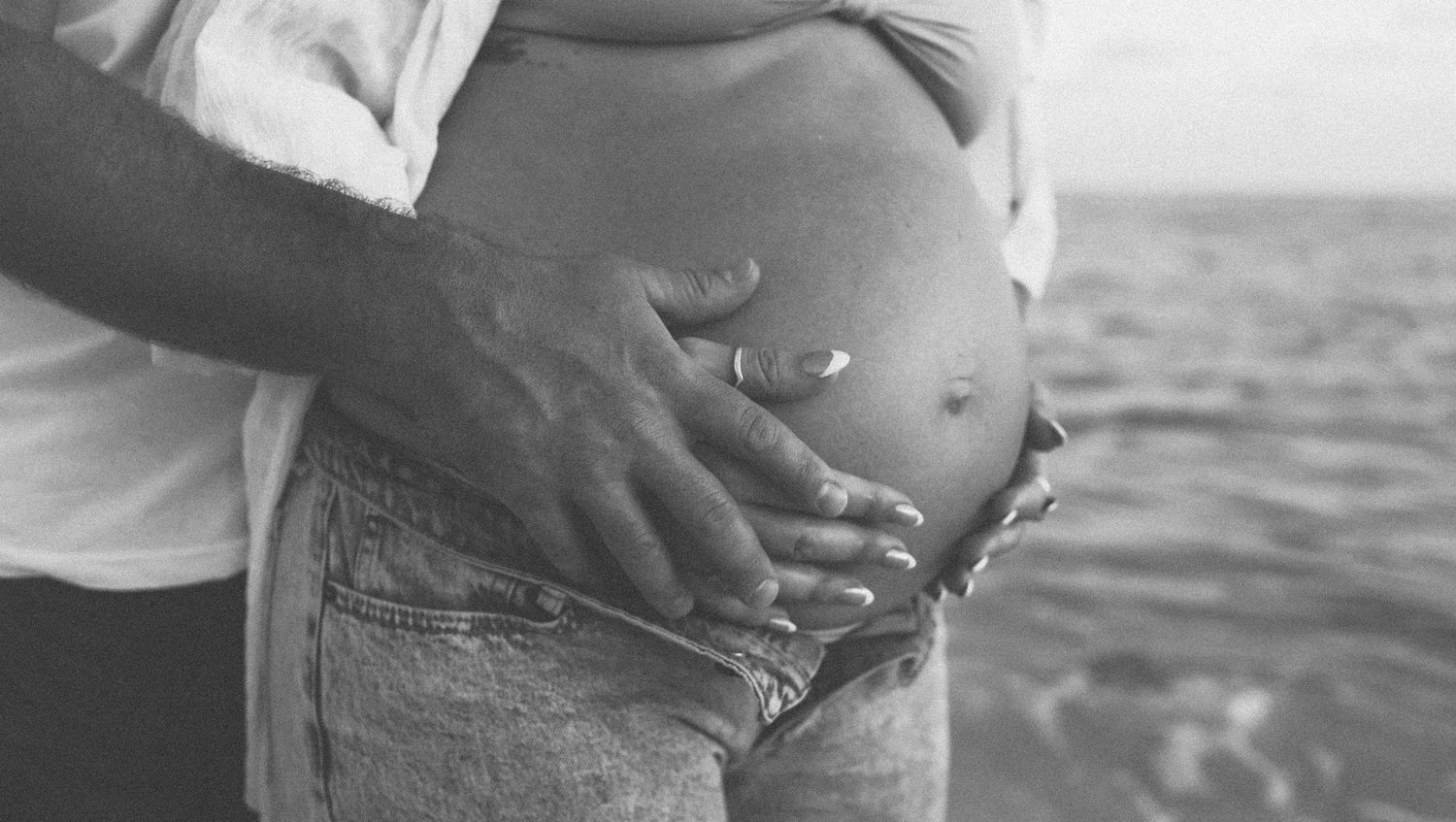 Key West motherhood photographer capturing emotional maternity portraits celebrating family and new life