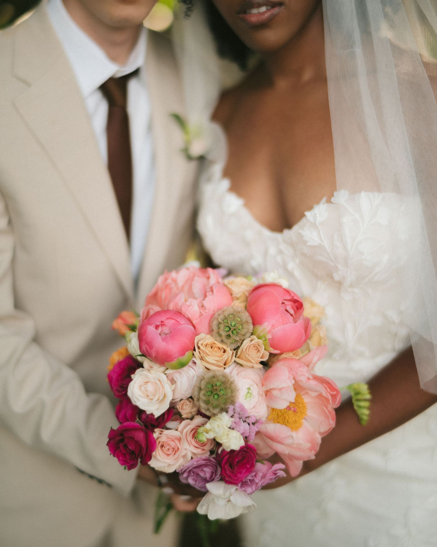Wedding couple photographed in natural light
Bride and groom embracing during wedding day
Candid moment from a Florida wedding