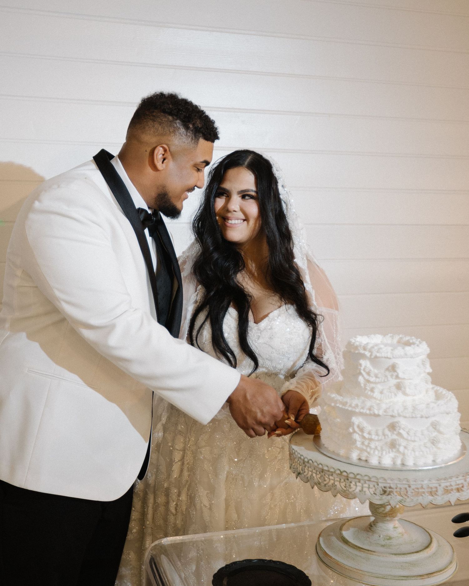 Wedding couple photographed in natural light
Bride and groom embracing during wedding day
Candid moment from a Florida wedding