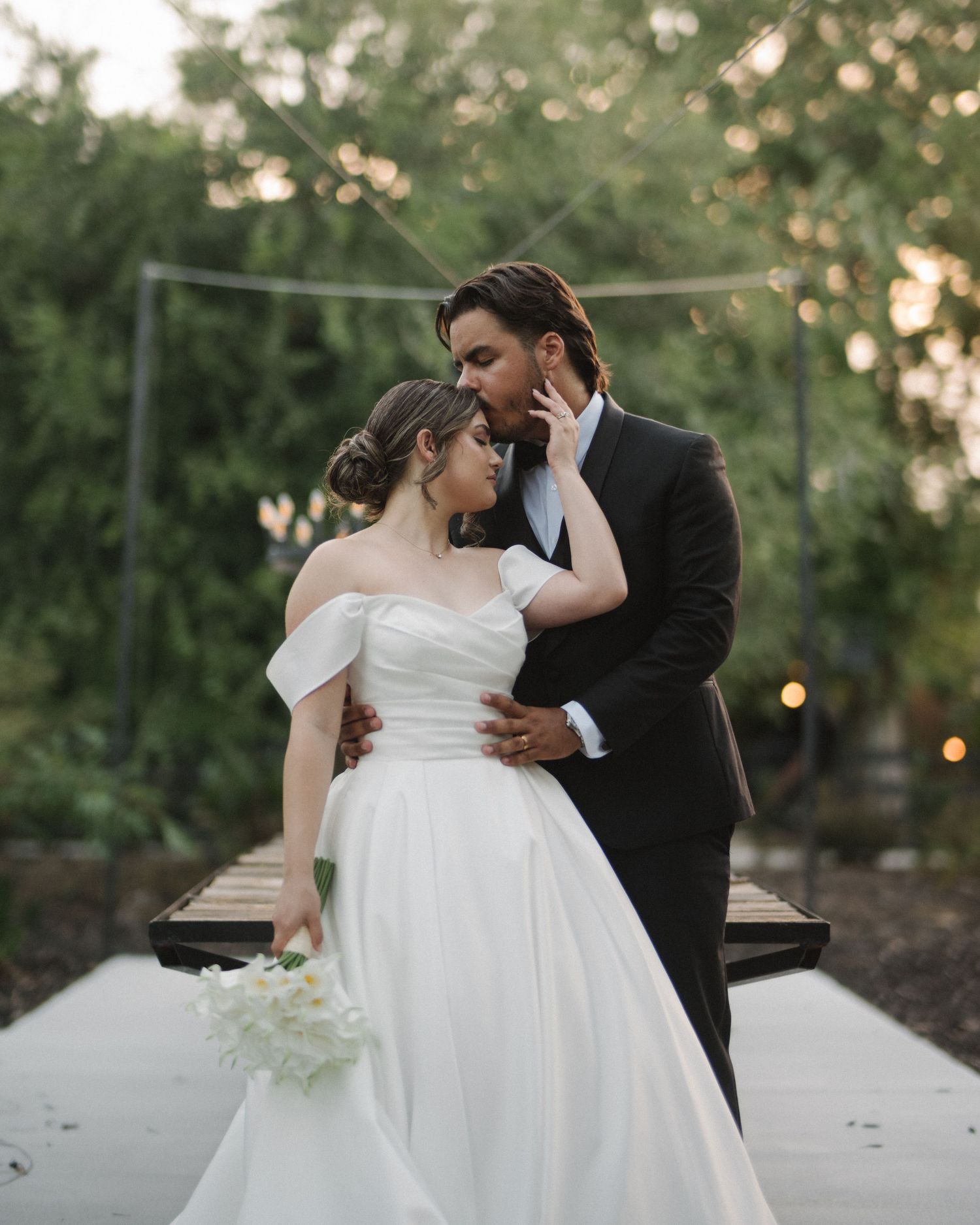 Wedding couple photographed in natural light
Bride and groom embracing during wedding day
Candid moment from a Florida wedding