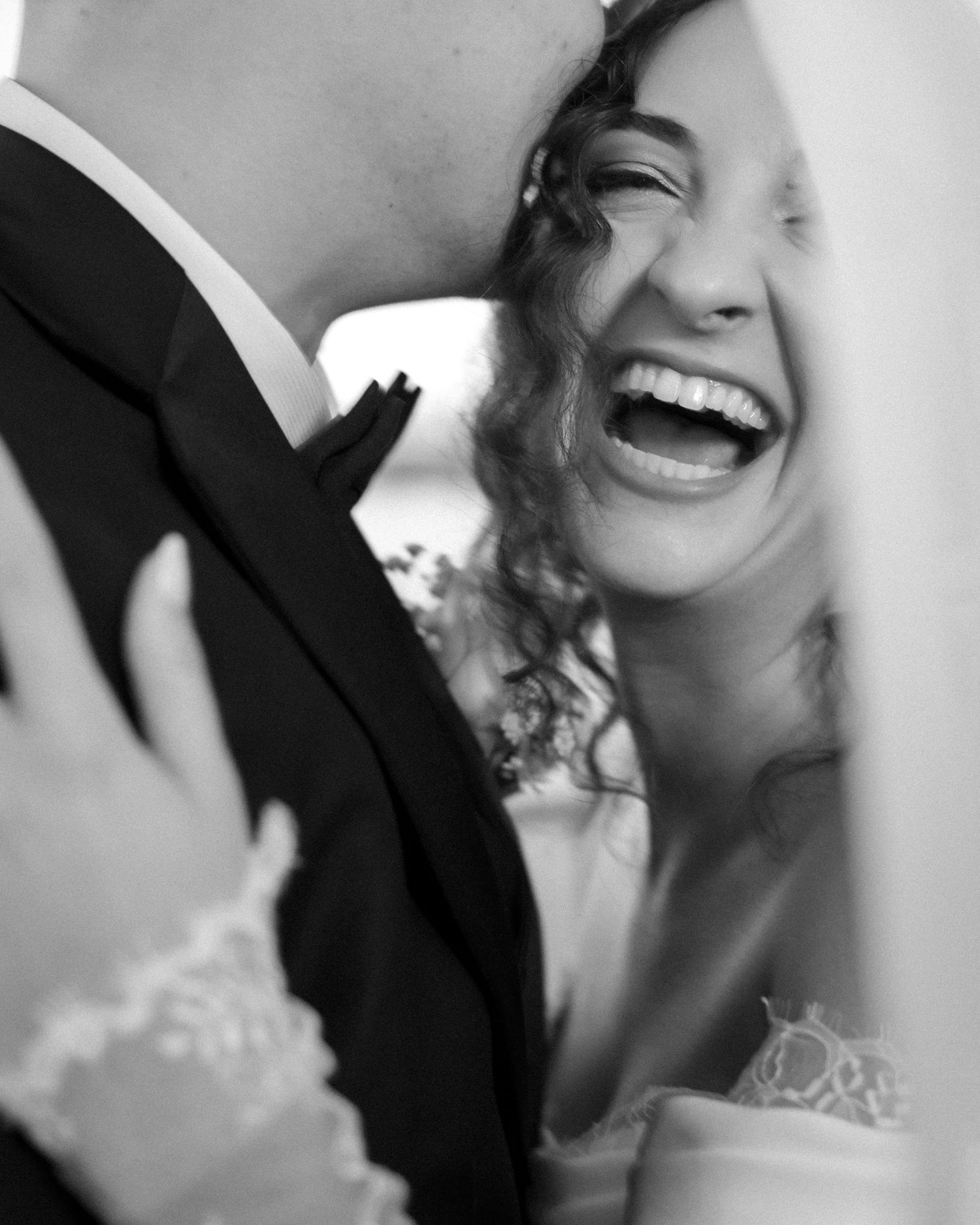 Wedding couple photographed in natural light
Bride and groom embracing during wedding day
Candid moment from a Florida wedding