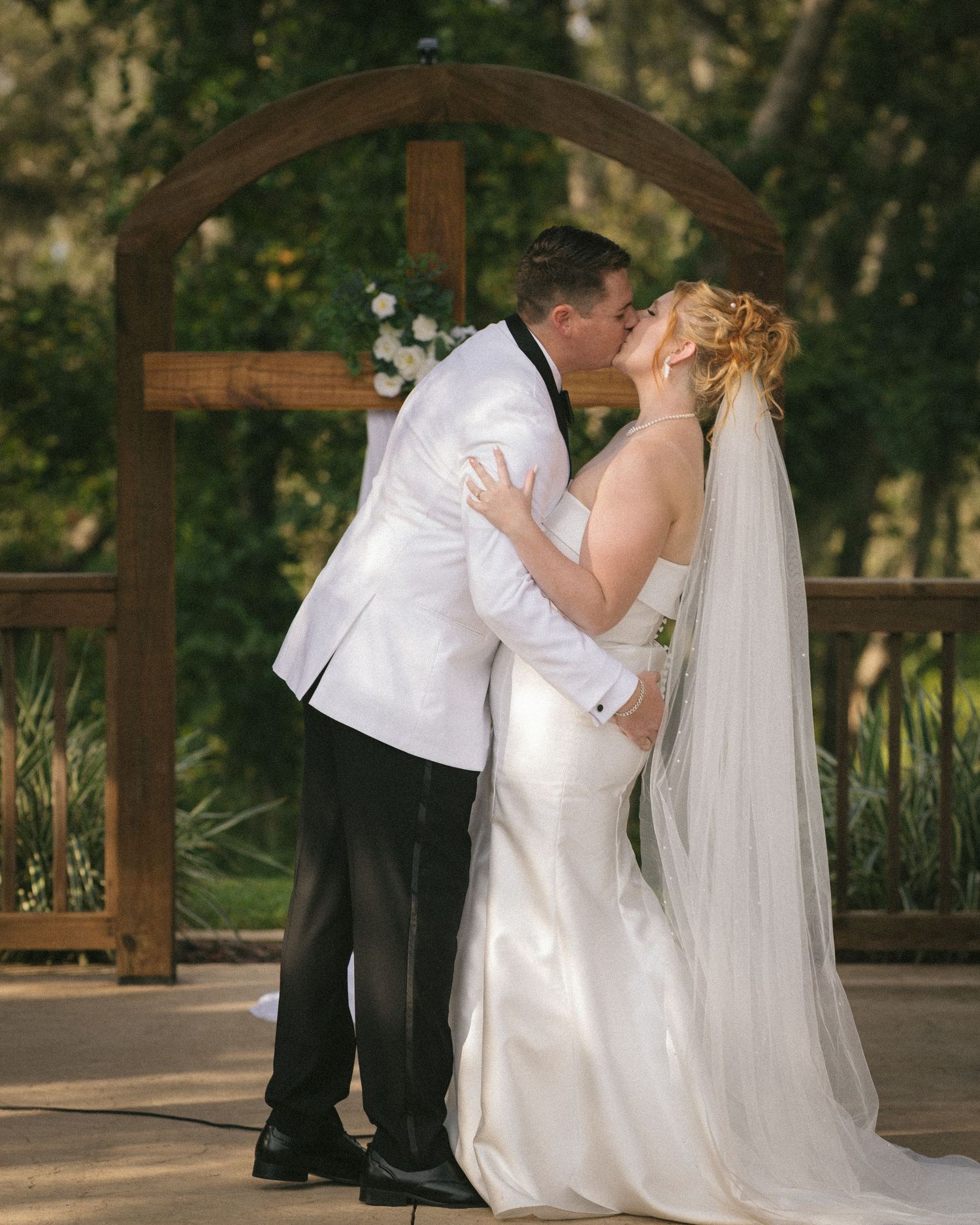 Wedding couple photographed in natural light
Bride and groom embracing during wedding day
Candid moment from a Florida wedding
