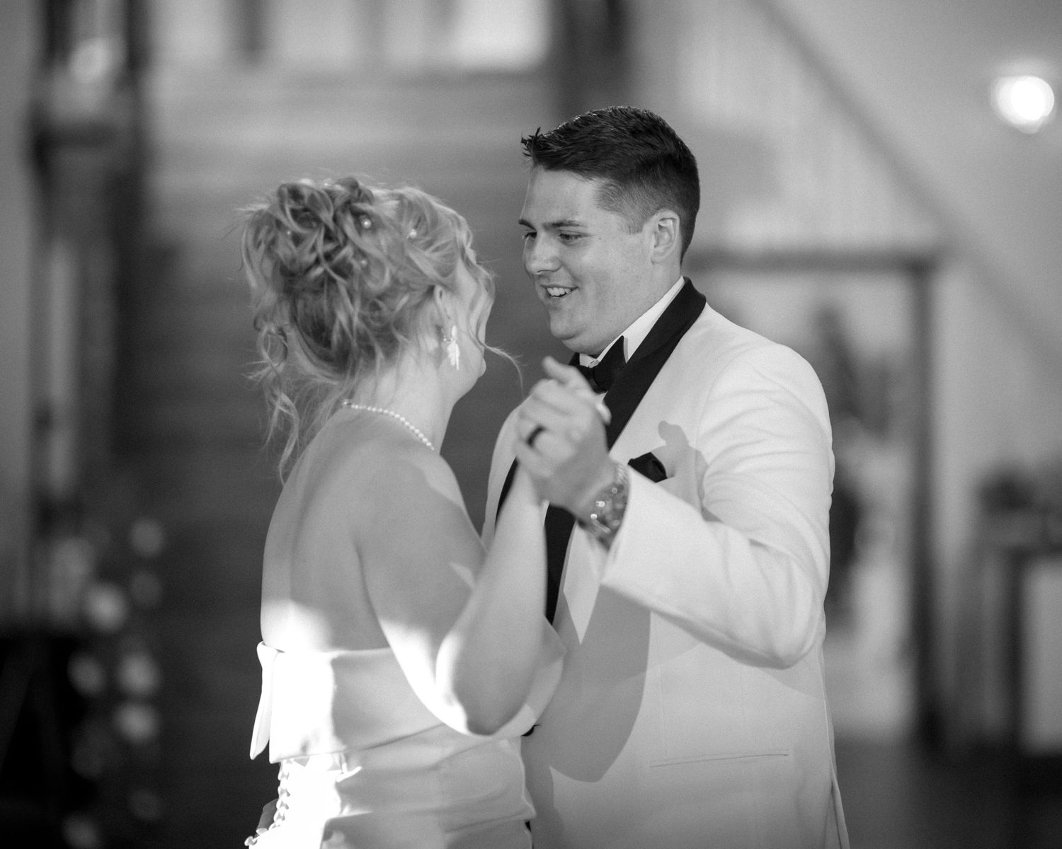 Wedding couple photographed in natural light
Bride and groom embracing during wedding day
Candid moment from a Florida wedding