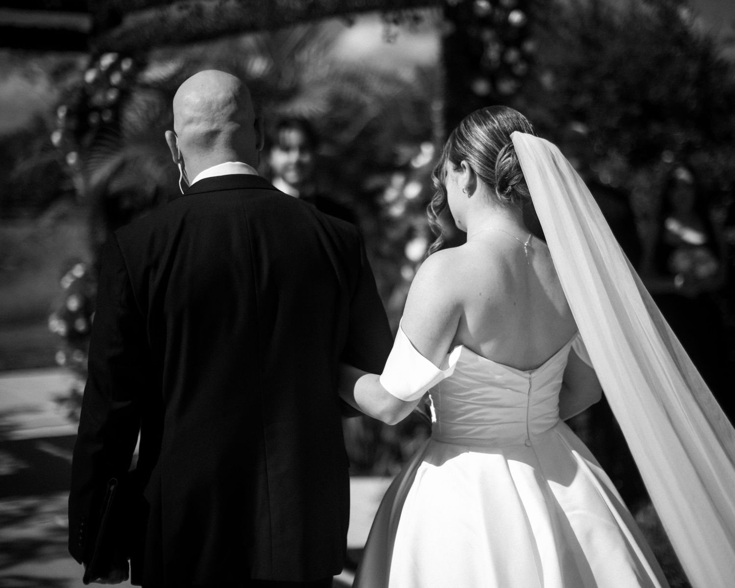 Wedding couple photographed in natural light
Bride and groom embracing during wedding day
Candid moment from a Florida wedding