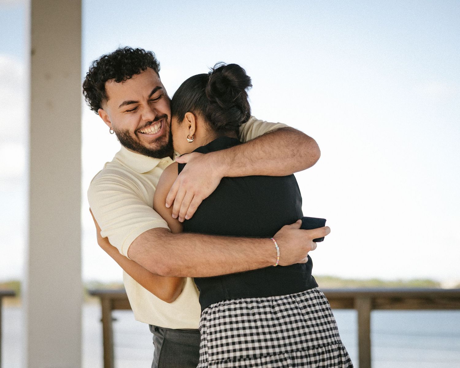 Wedding couple photographed in natural light
Bride and groom embracing during wedding day
Candid moment from a Florida wedding