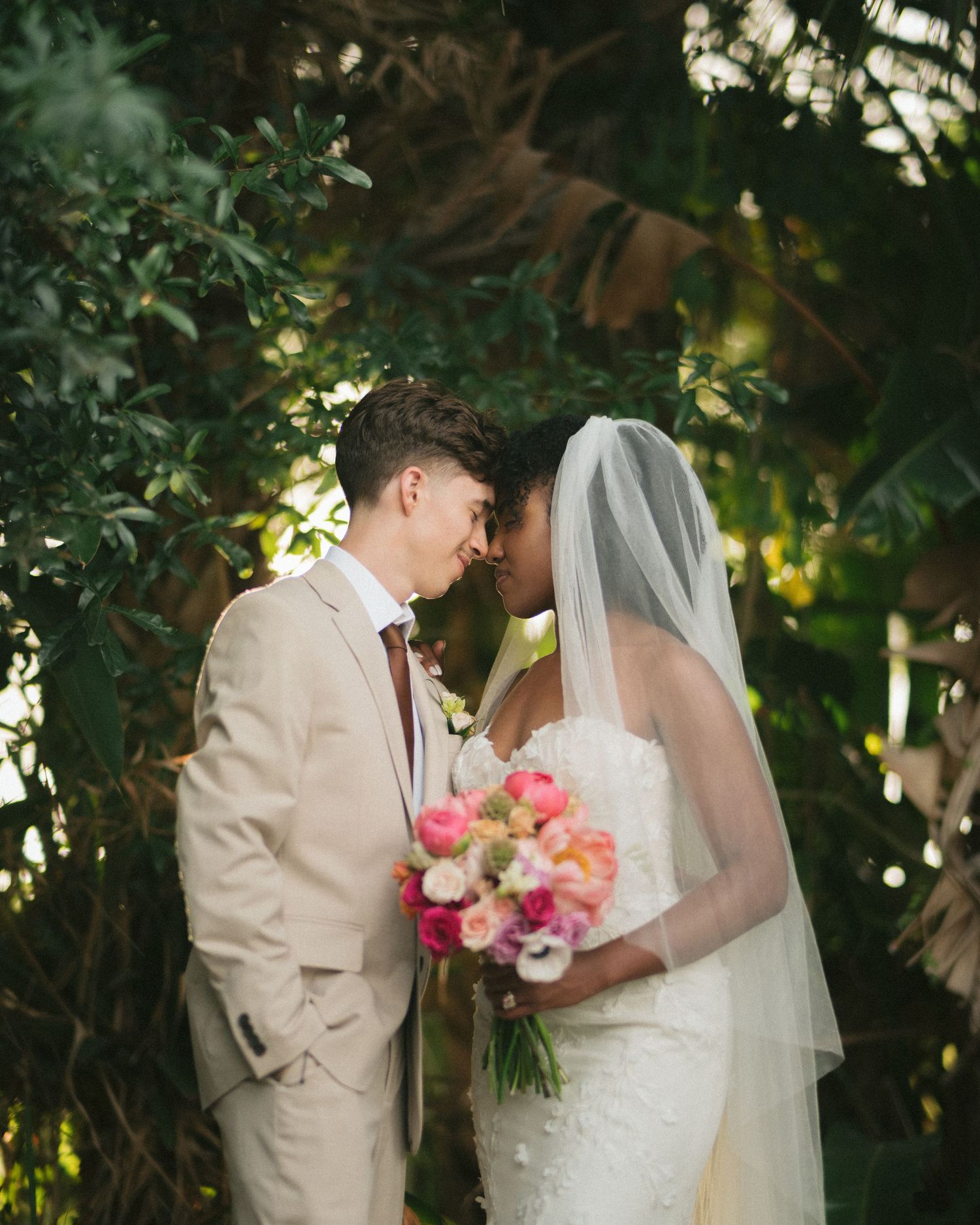 Wedding couple photographed in natural light
Bride and groom embracing during wedding day
Candid moment from a Florida wedding