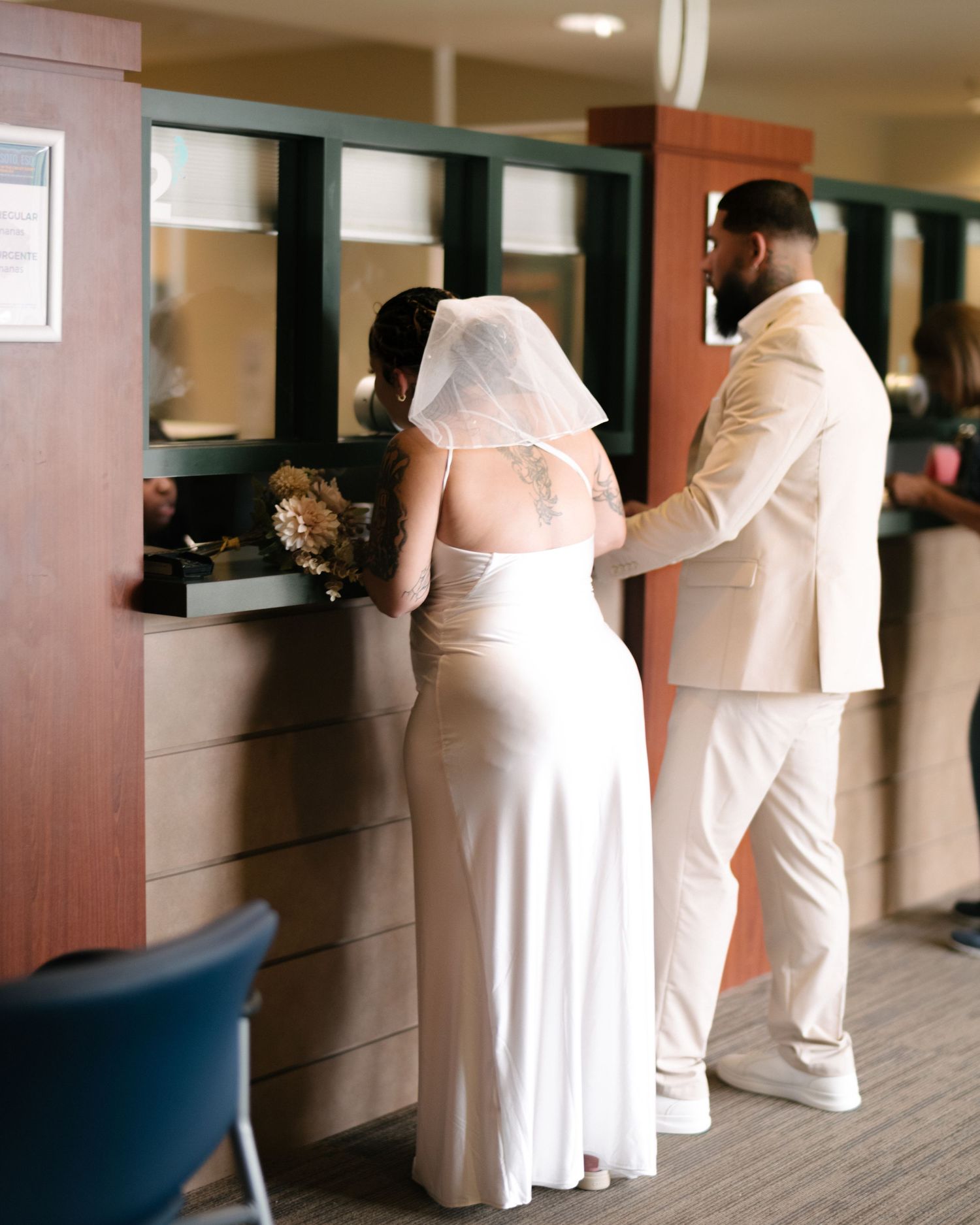 Wedding couple photographed in natural light
Bride and groom embracing during wedding day
Candid moment from a Florida wedding