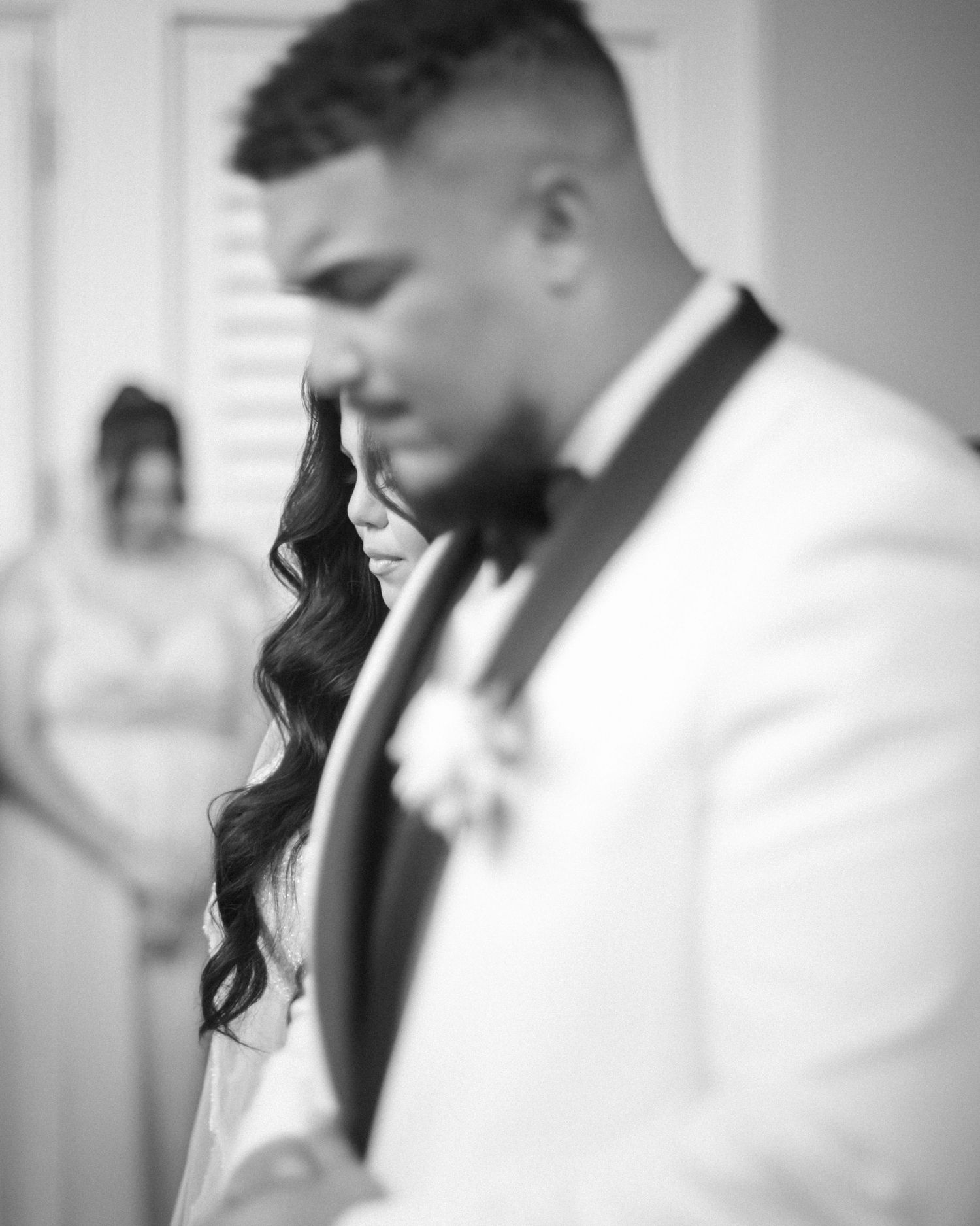 Wedding couple photographed in natural light
Bride and groom embracing during wedding day
Candid moment from a Florida wedding